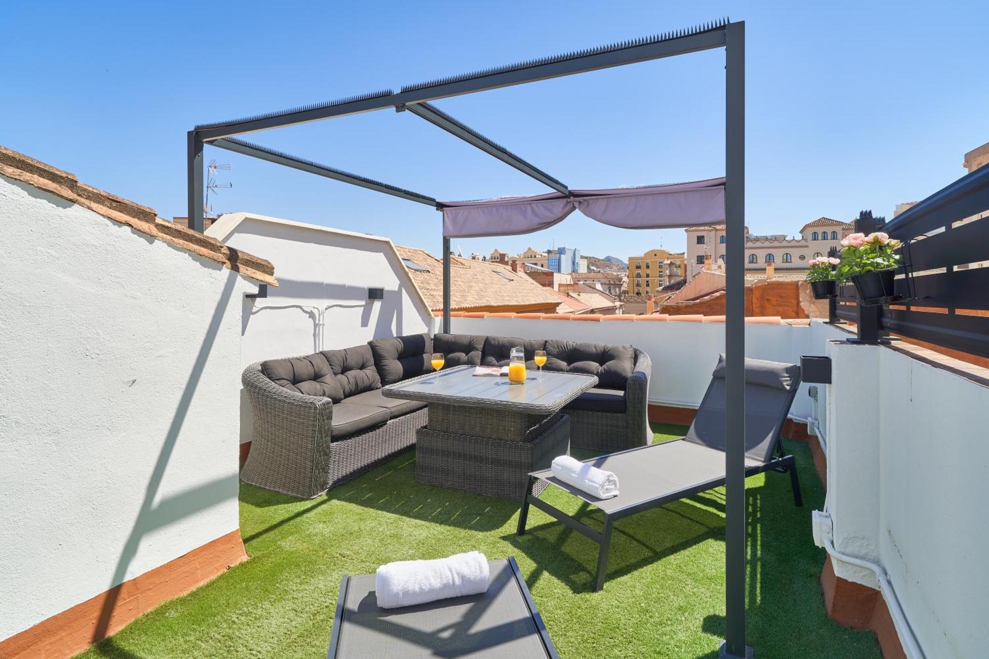 Sun-Kissed Getaway Apartment Malaga Bagian luar foto